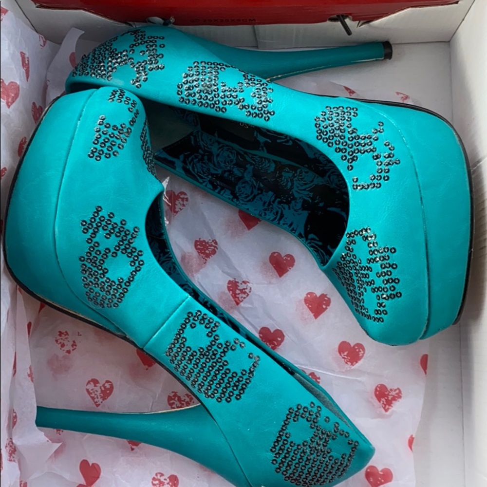 Teal /black skulls iron fist platforms